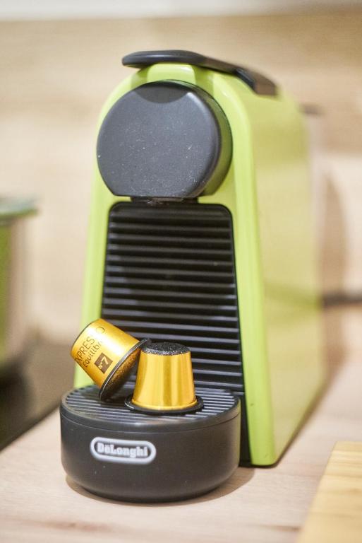 a close up of a electronic device with a ring on it at Studio cosy Valmy- Vaise-Lyon centre in Lyon