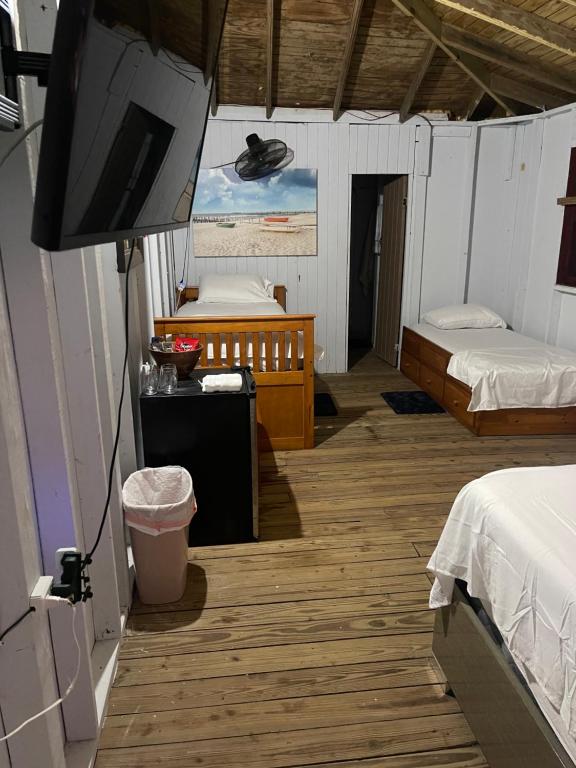 Postel nebo postele na pokoji v ubytování Sunrise Cottage