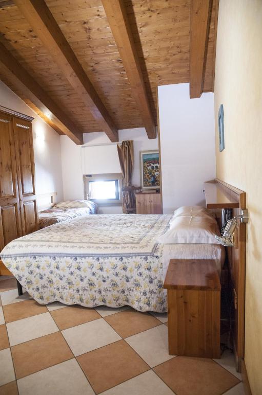 Postel nebo postele na pokoji v ubytování Casa Hellen