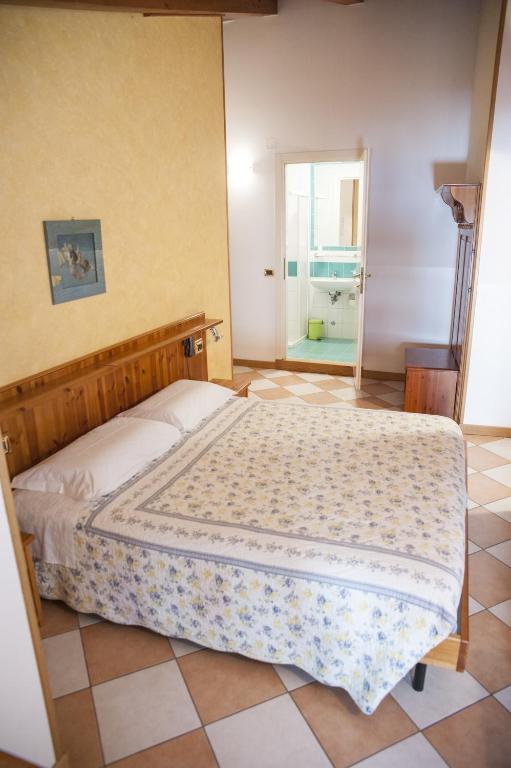 Postel nebo postele na pokoji v ubytování Casa Hellen