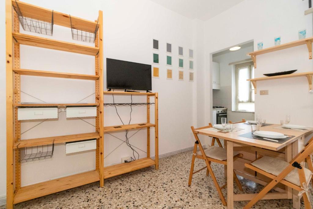 TV a/nebo společenská místnost v ubytování Torino Pitagora Functional Flat