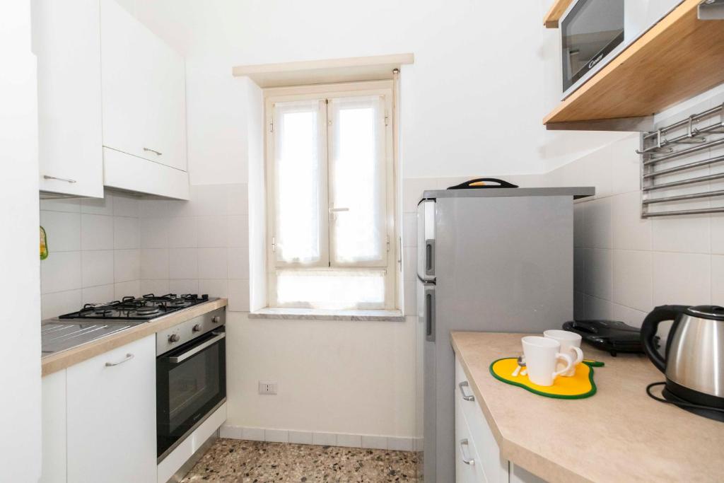 Kuchyň nebo kuchyňský kout v ubytování Torino Pitagora Functional Flat