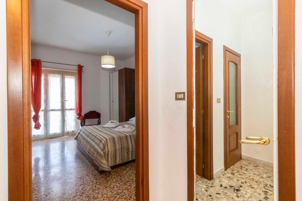 Postel nebo postele na pokoji v ubytování Torino Pitagora Functional Flat