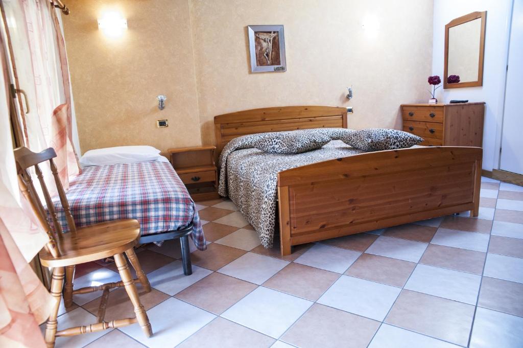 Postel nebo postele na pokoji v ubytování Casa Hellen