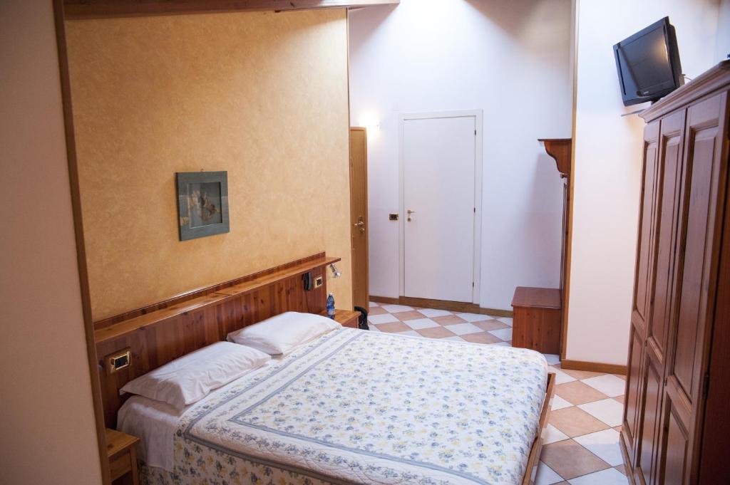 Postel nebo postele na pokoji v ubytování Casa Hellen