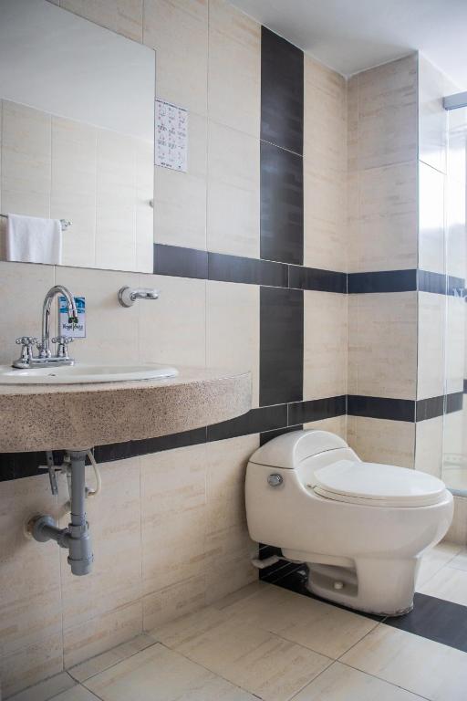 Koupelna v ubytování Nogal Suite Hotel Pasto