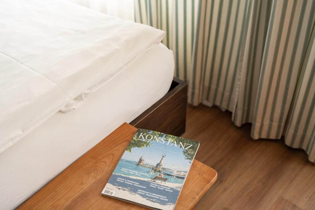 Postel nebo postele na pokoji v ubytování Hotel am Fischmarkt