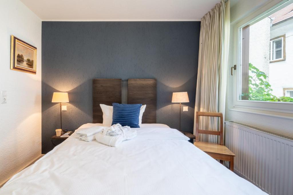 Postel nebo postele na pokoji v ubytování Hotel am Fischmarkt