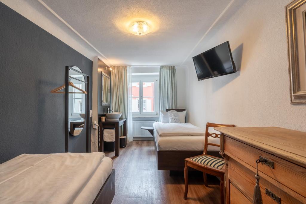 Postel nebo postele na pokoji v ubytování Hotel am Fischmarkt