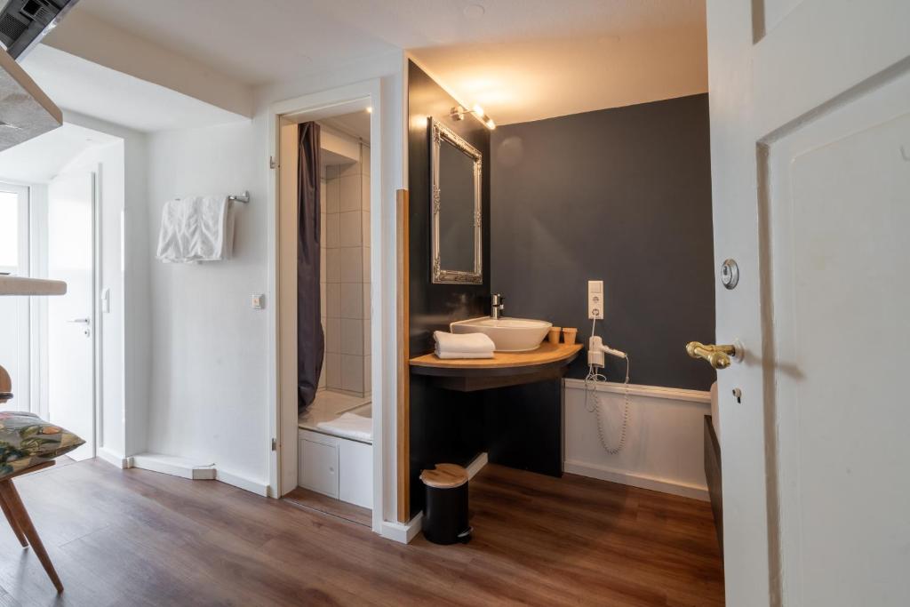 Koupelna v ubytování Hotel am Fischmarkt