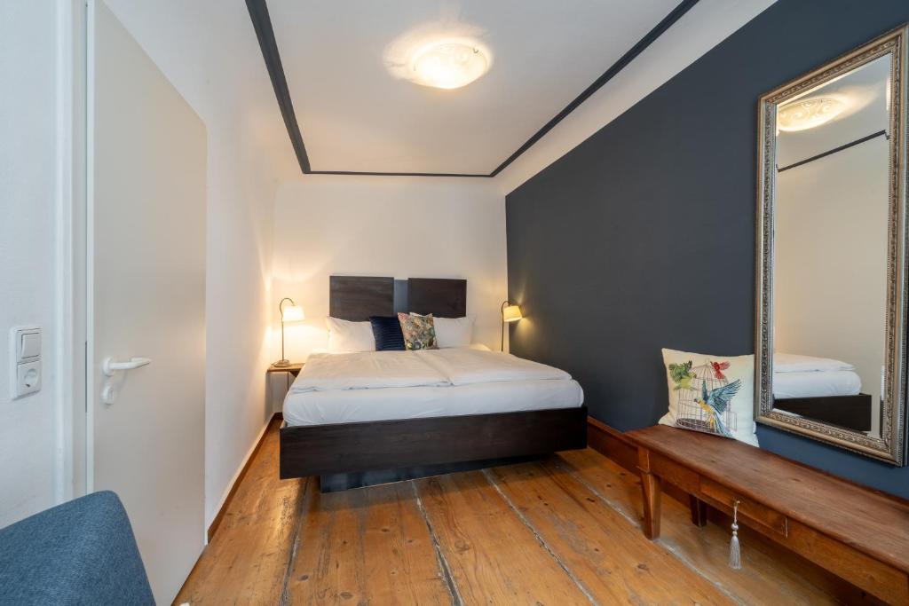 Postel nebo postele na pokoji v ubytování Hotel am Fischmarkt