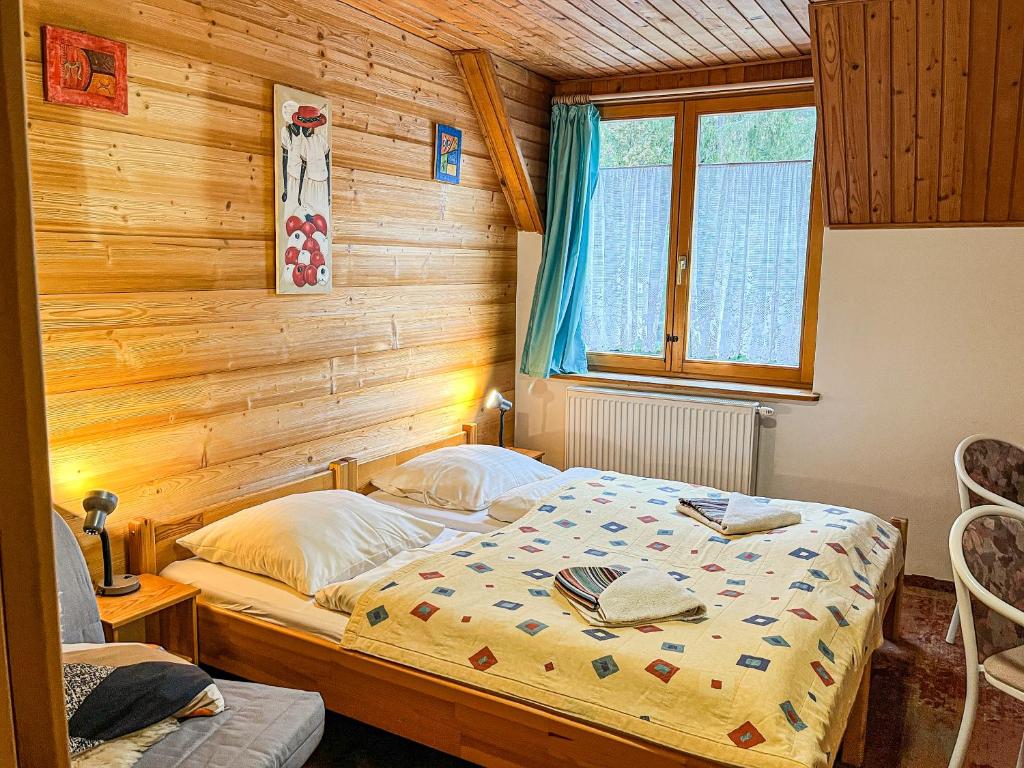Postel nebo postele na pokoji v ubytování Penzion Limba