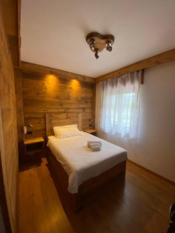 Posteľ alebo postele v izbe v ubytovaní Hotel Oasi