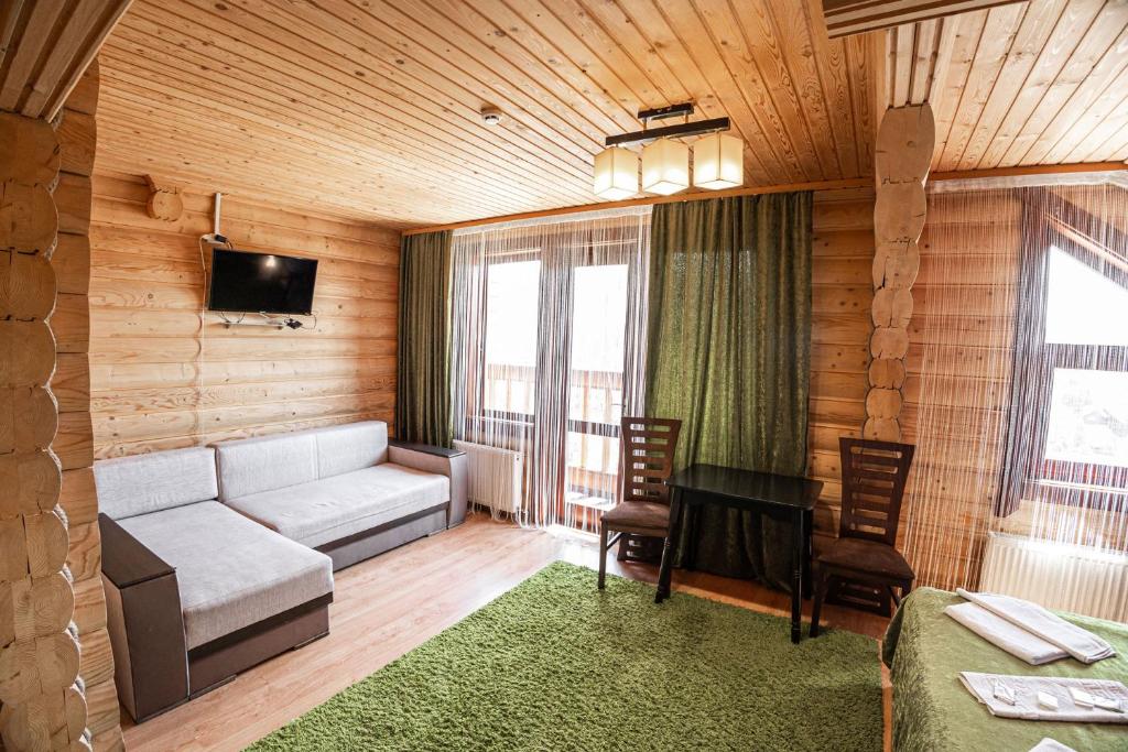 Postel nebo postele na pokoji v ubytování Готель Чарда