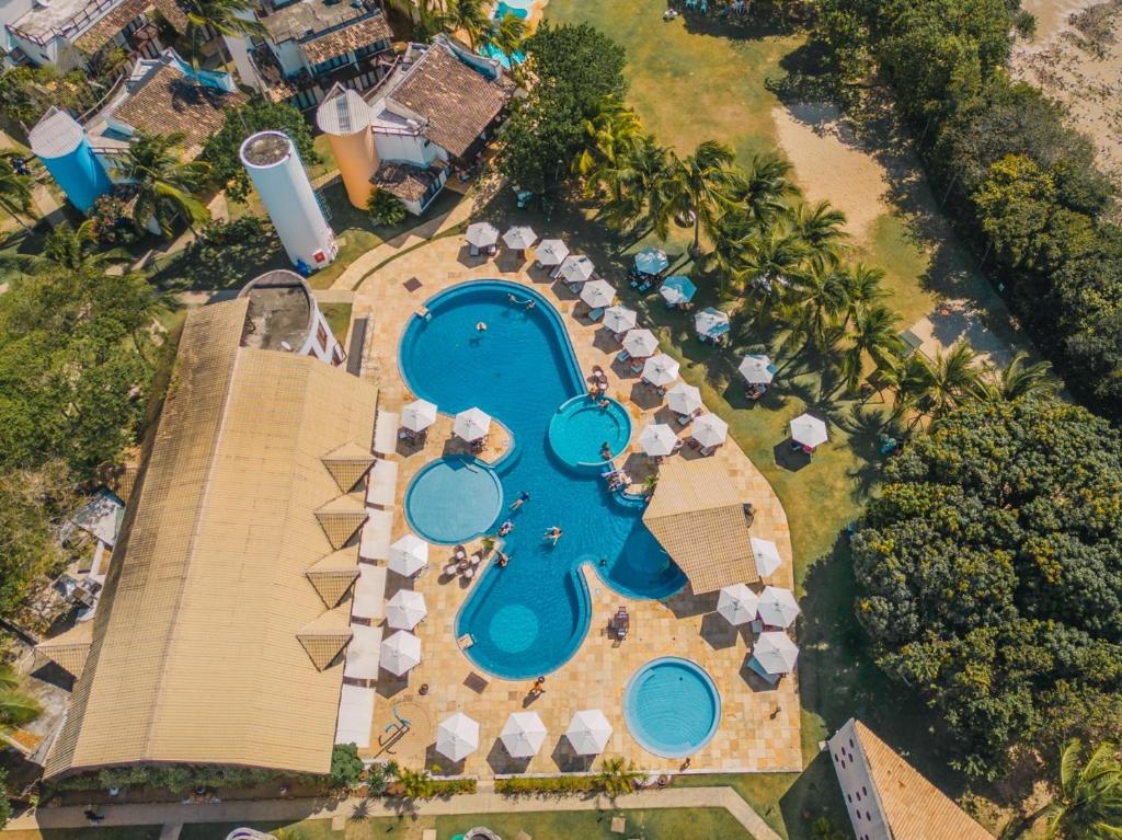 an aerial view of a resort with a swimming pool at Sun Bay Pipa Hotéis in Pipa