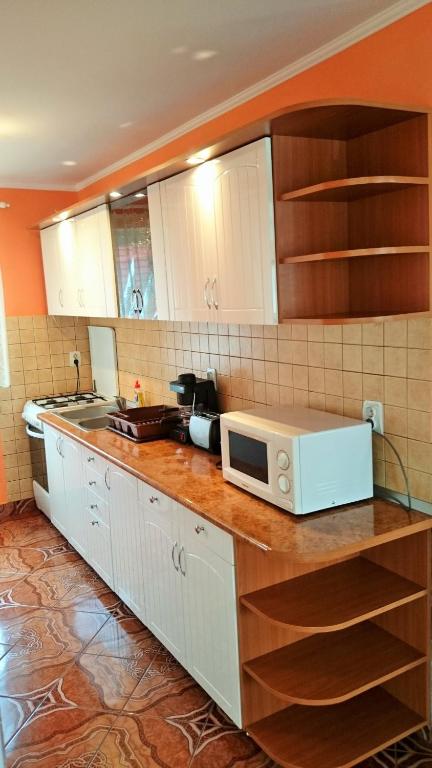 Kuchyň nebo kuchyňský kout v ubytování Casa Flamingo