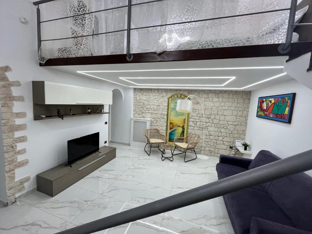 TV a/nebo společenská místnost v ubytování casa esmeralda