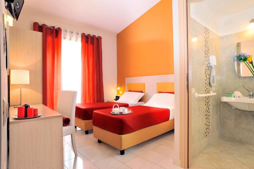 Postel nebo postele na pokoji v ubytování Hotel Scott House