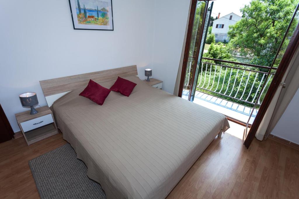 Postel nebo postele na pokoji v ubytování Villa Croatia
