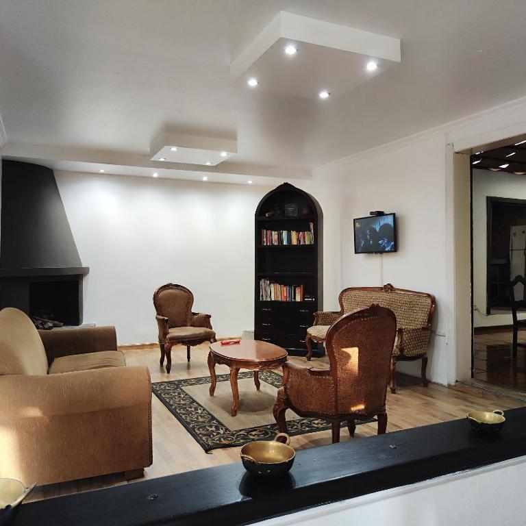 Posezení v ubytování Hotel Muros Quito