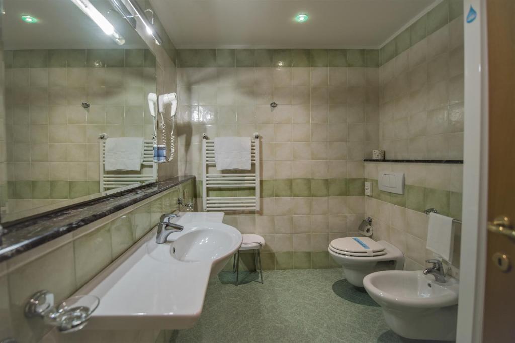 Koupelna v ubytování Hotel Le Grotte