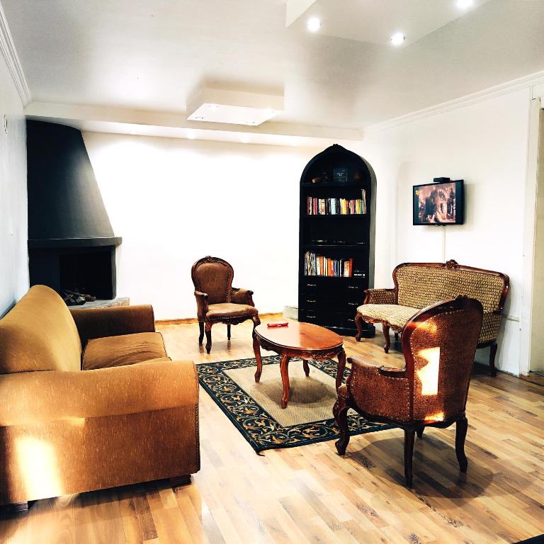 Posezení v ubytování Hotel Muros Quito