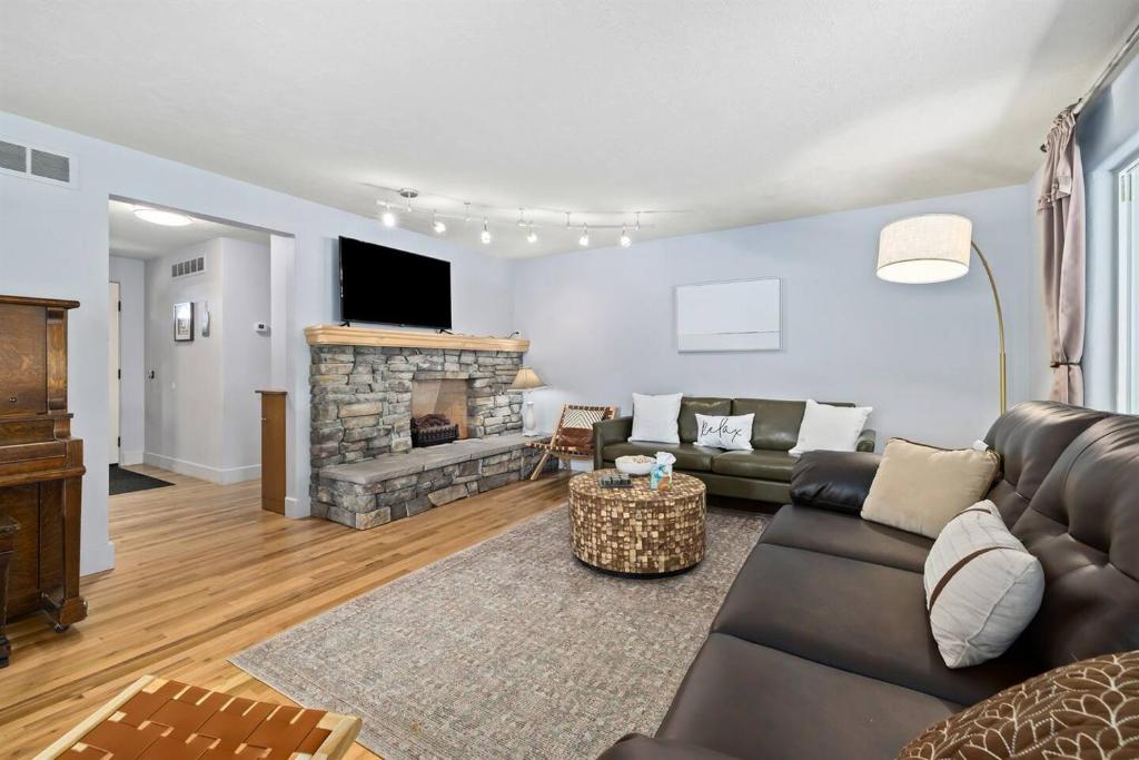 a living room with a couch and a fireplace at 1950s Charmer in Boise