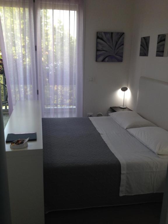 Postel nebo postele na pokoji v ubytování B&B Pitstop