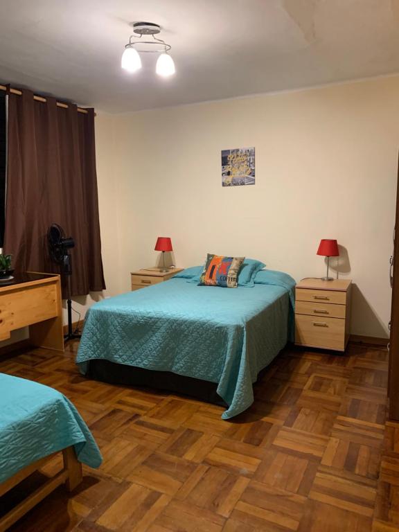 Postel nebo postele na pokoji v ubytování Uli´s house
