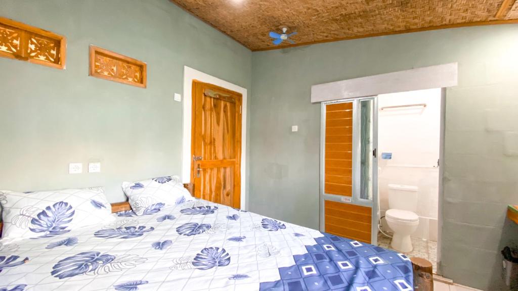 Wooden Kemiren Homestay Banyuwangi - 阳台的双人间