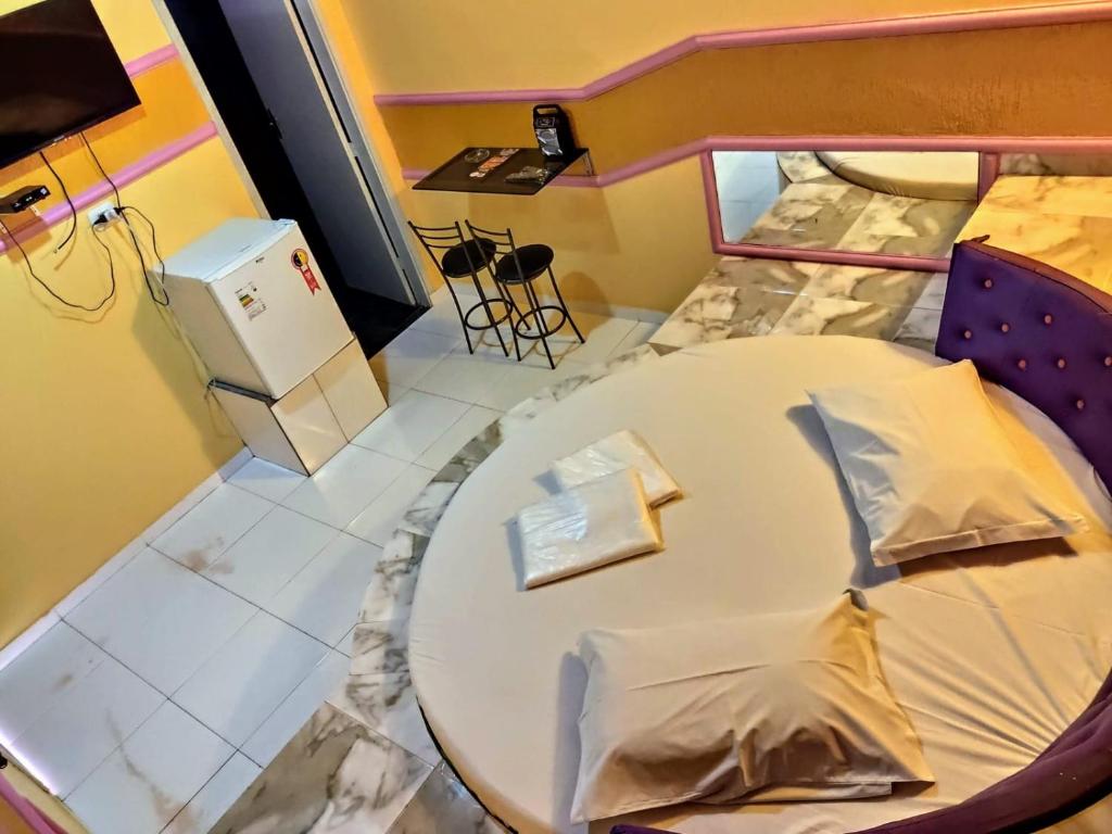 Postel nebo postele na pokoji v ubytování Hotel Paraíso