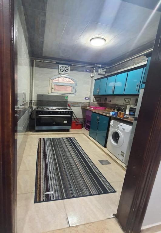 Kuchyň nebo kuchyňský kout v ubytování M&H Apartment