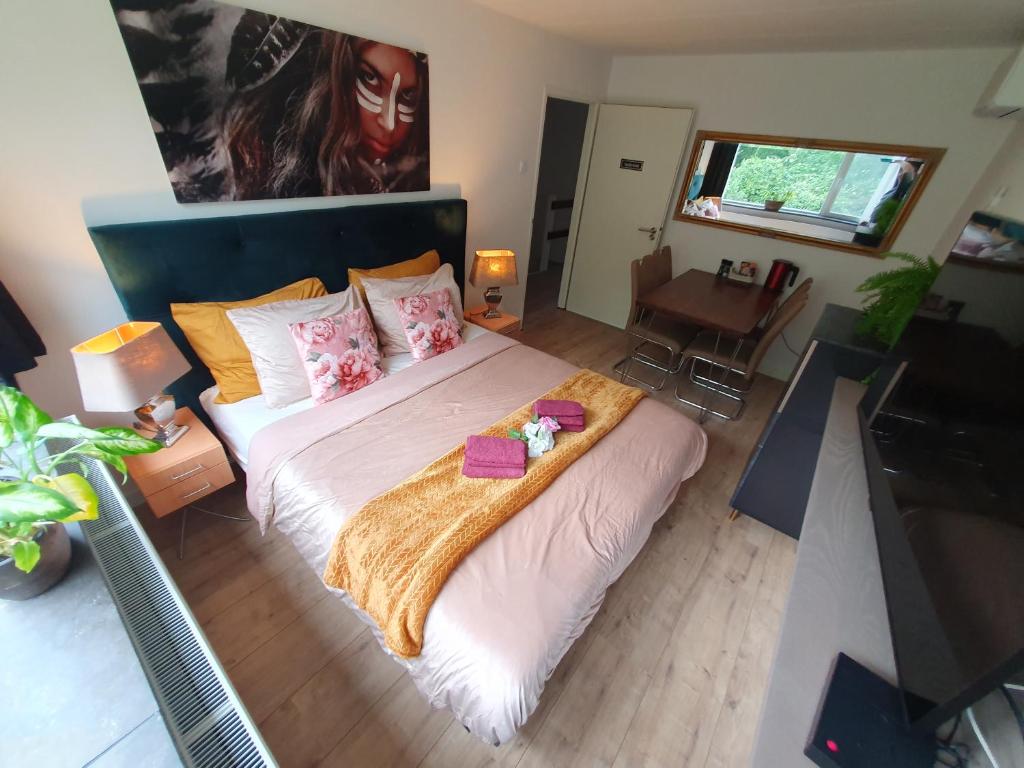 Postel nebo postele na pokoji v ubytování B&B Immerloopark
