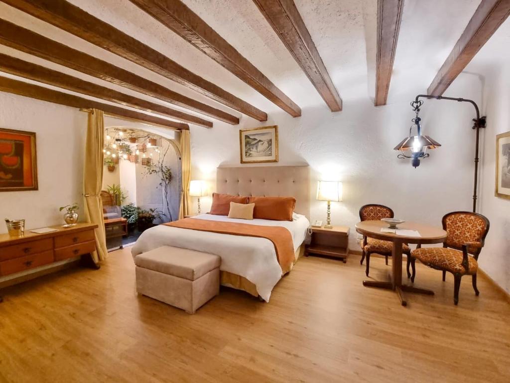 Postel nebo postele na pokoji v ubytování Antara Hotel & Suites - Miraflores