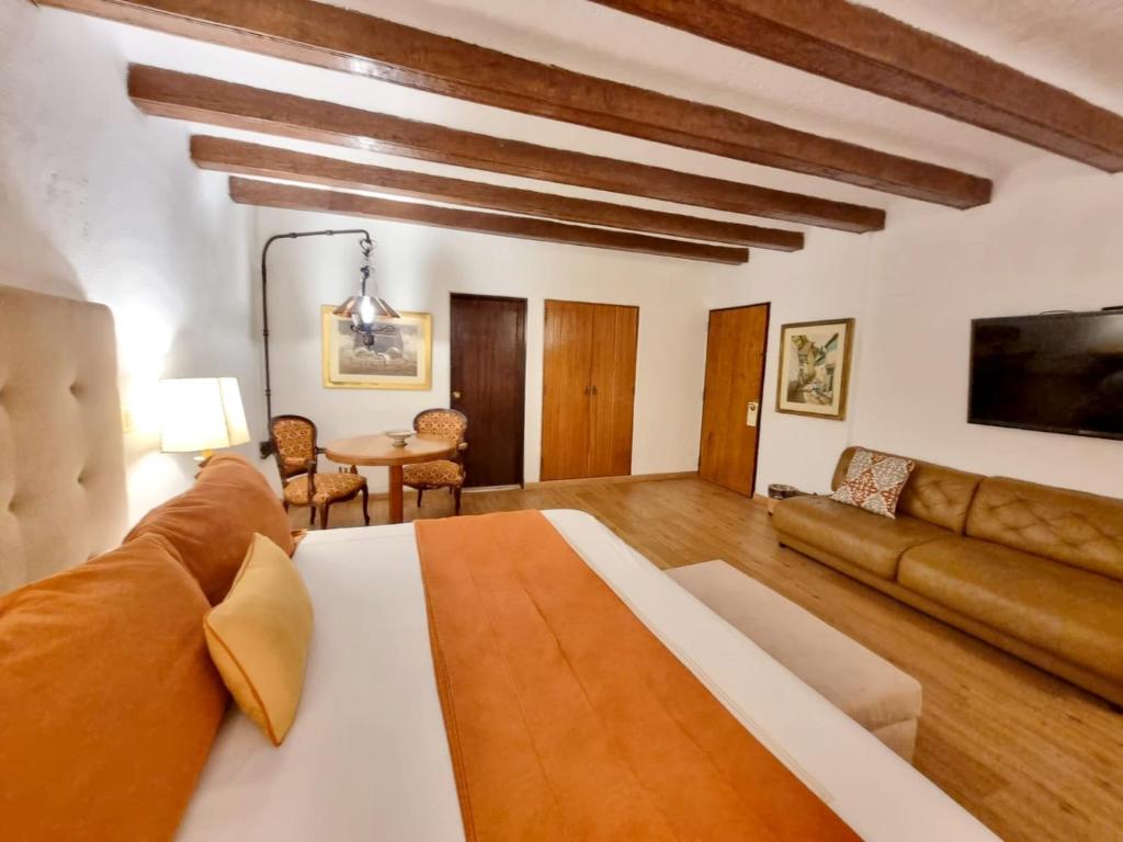 TV a/nebo společenská místnost v ubytování Antara Hotel & Suites - Miraflores