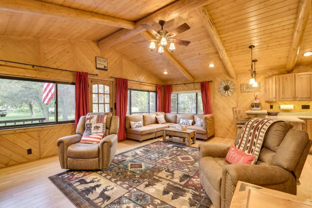 a living room with a couch and two chairs at Creekside Ten Sleep Vacation Rental and Deck and Grill in Ten Sleep