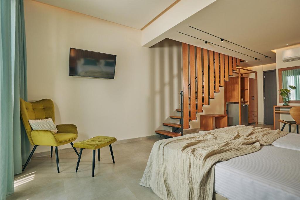 Postel nebo postele na pokoji v ubytování Letsos Hotel