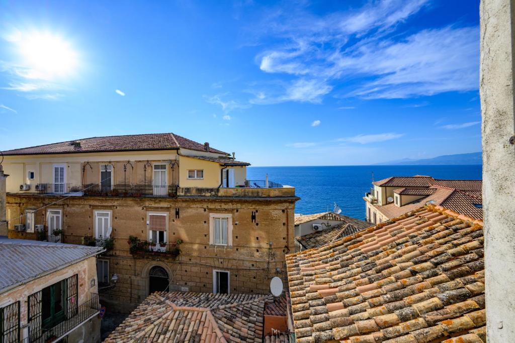 a view of a building from the roofs of houses at Casa Francesco in Pizzo