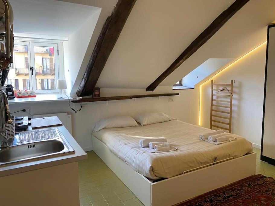 En eller flere senge i et værelse på A Due Passi dal Centro