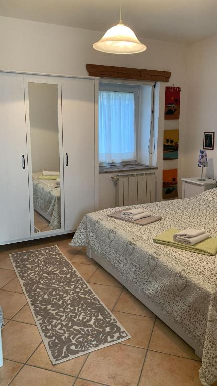 Postel nebo postele na pokoji v ubytování Alla Stazione