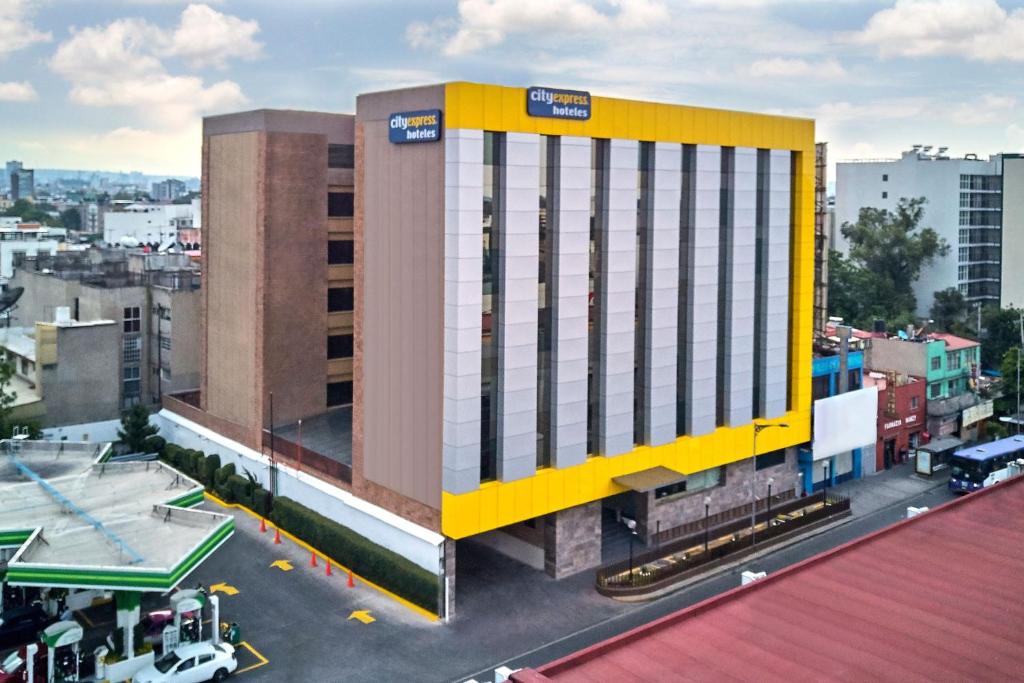 an overhead view of a building in a city at City Express by Marriott CDMX Tlalpan in Mexico City