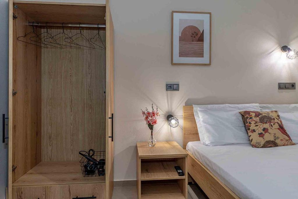 Postel nebo postele na pokoji v ubytování Fragkos Doukas Rooms