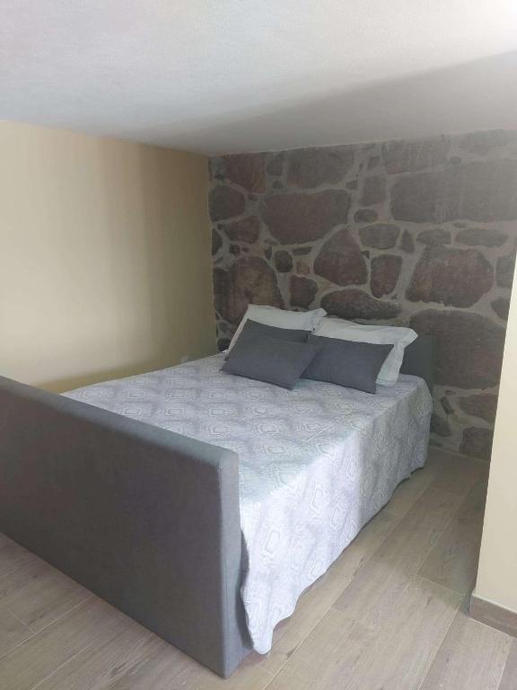 Postel nebo postele na pokoji v ubytování Casa dos Devezas