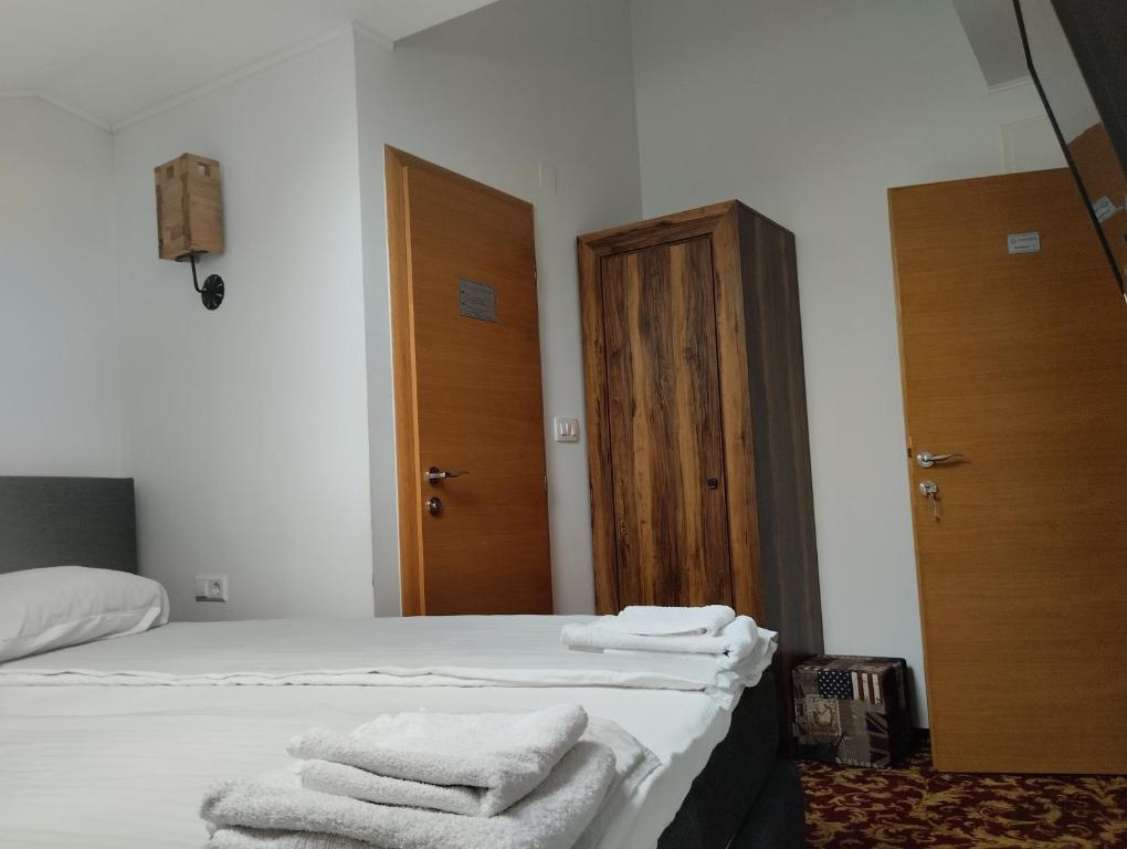 Postel nebo postele na pokoji v ubytování Residence Mahala