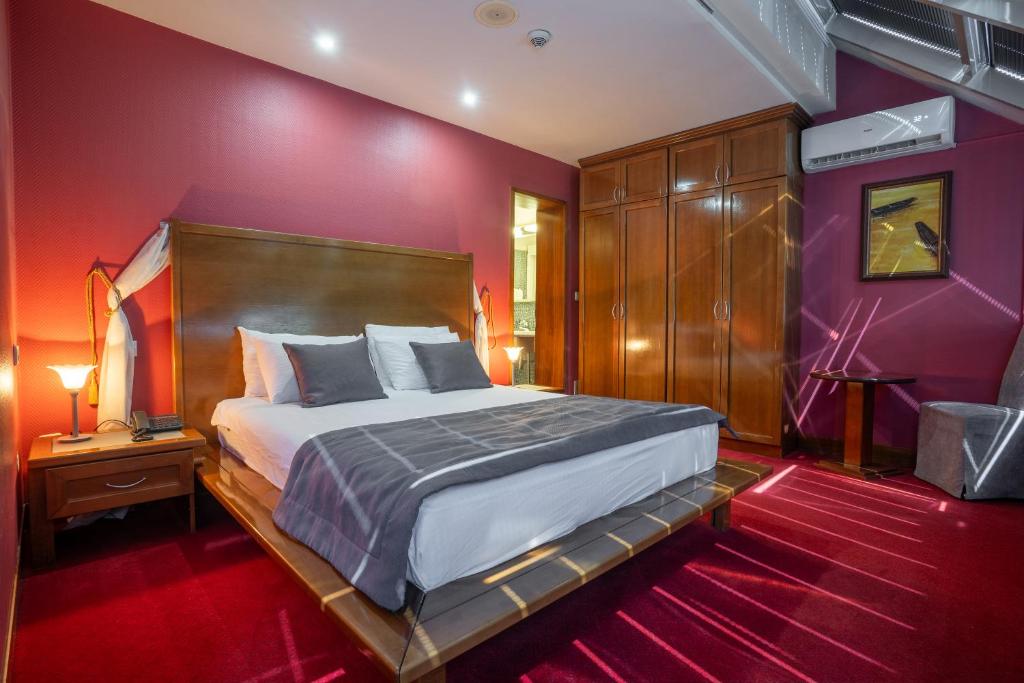 Postel nebo postele na pokoji v ubytování Hotel Astra