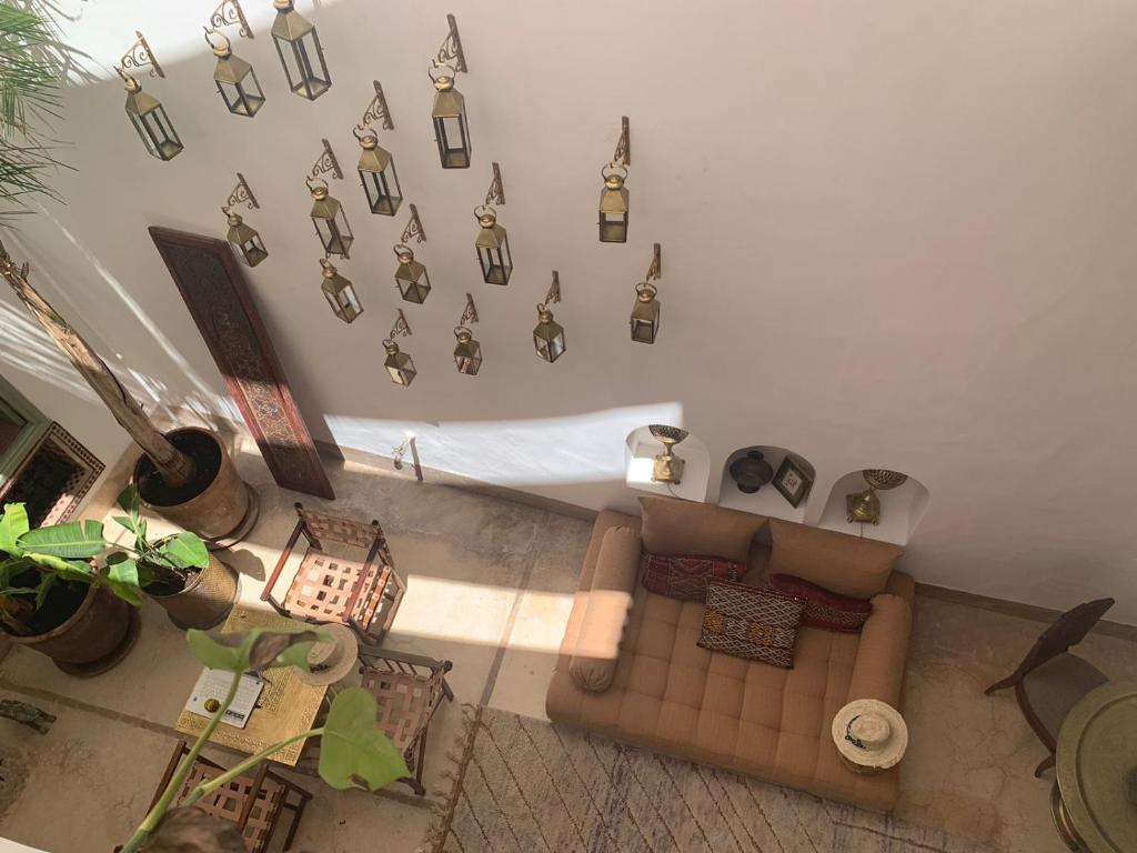 an overhead view of a living room with a couch at Riad la Cigale in Marrakesh