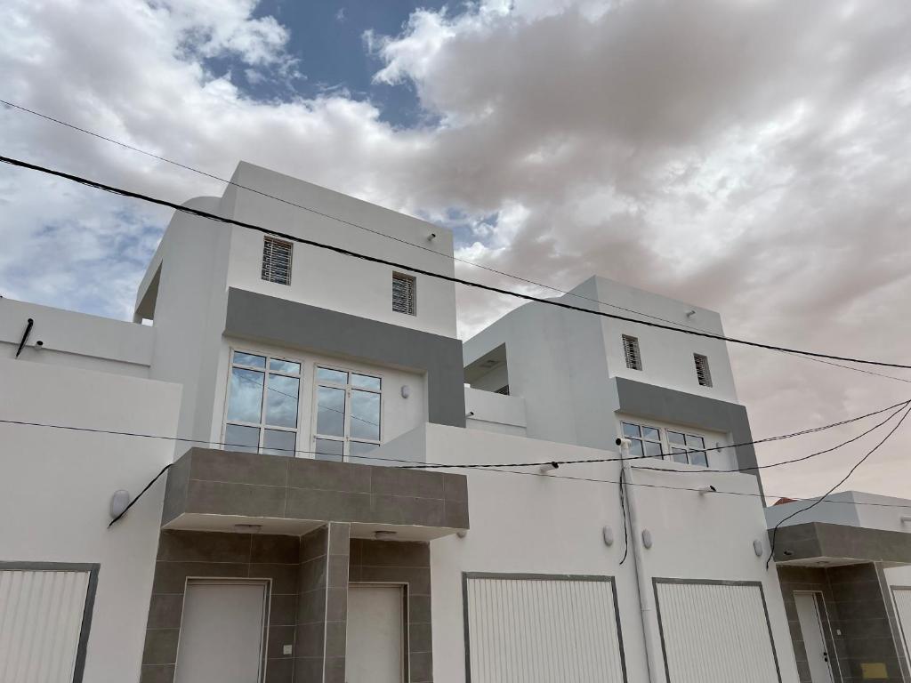 a white building with a sky in the background at 1704 A&D Tevragh Zeina in Nouakchott