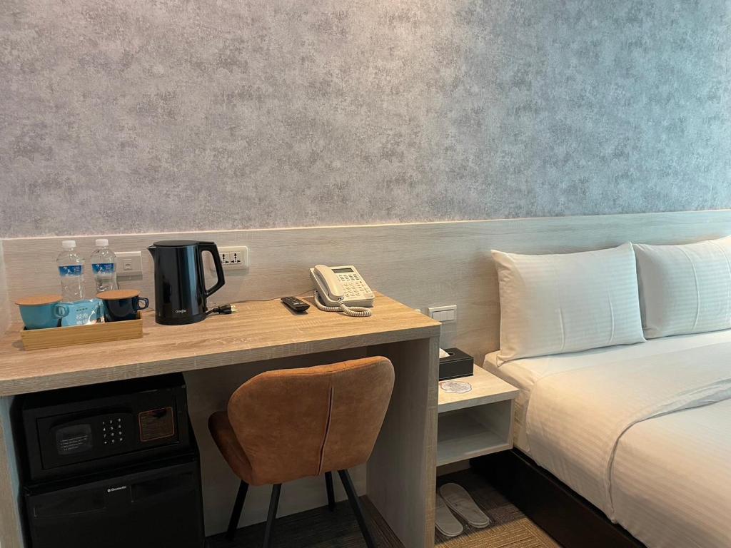 Katil atau katil-katil dalam bilik di 西門雲町旅店 Sky Gate Hotel