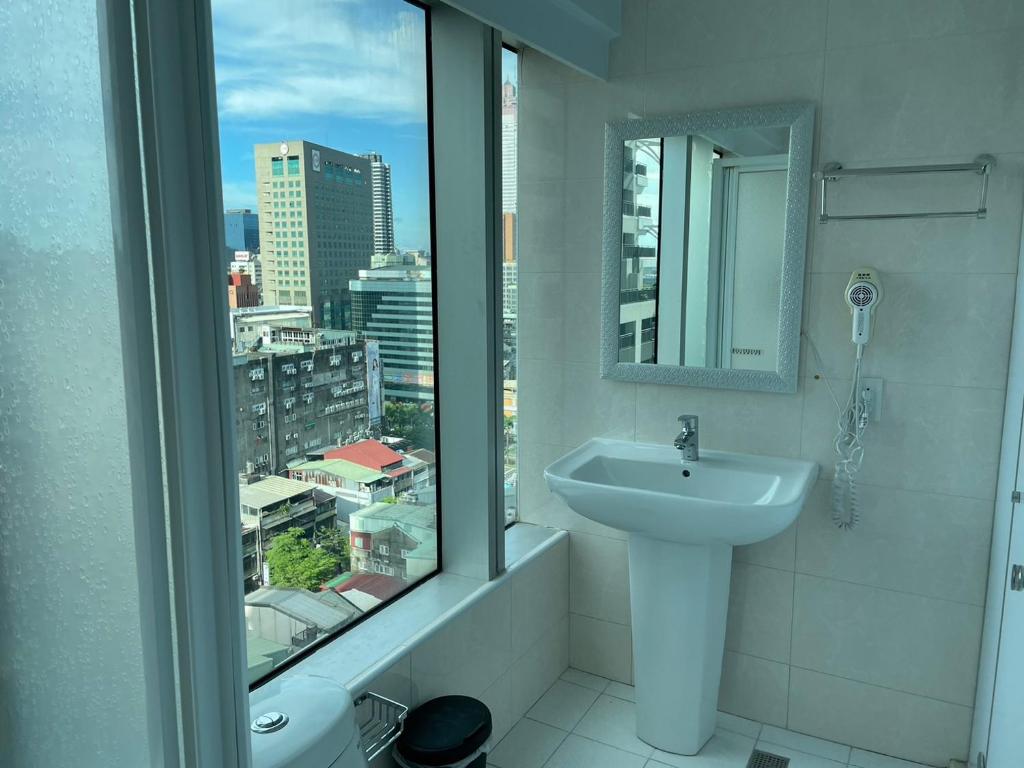Bilik mandi di 西門雲町旅店 Sky Gate Hotel