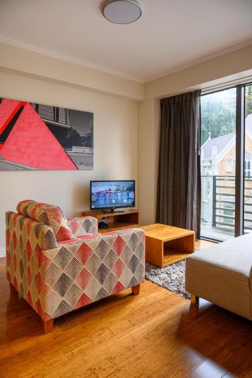 TV a/nebo společenská místnost v ubytování Boulcott Suites